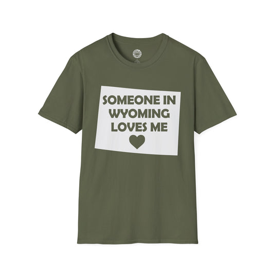 Green t-shirt with 'Someone in Wyoming loves me' text and heart graphic on a white background