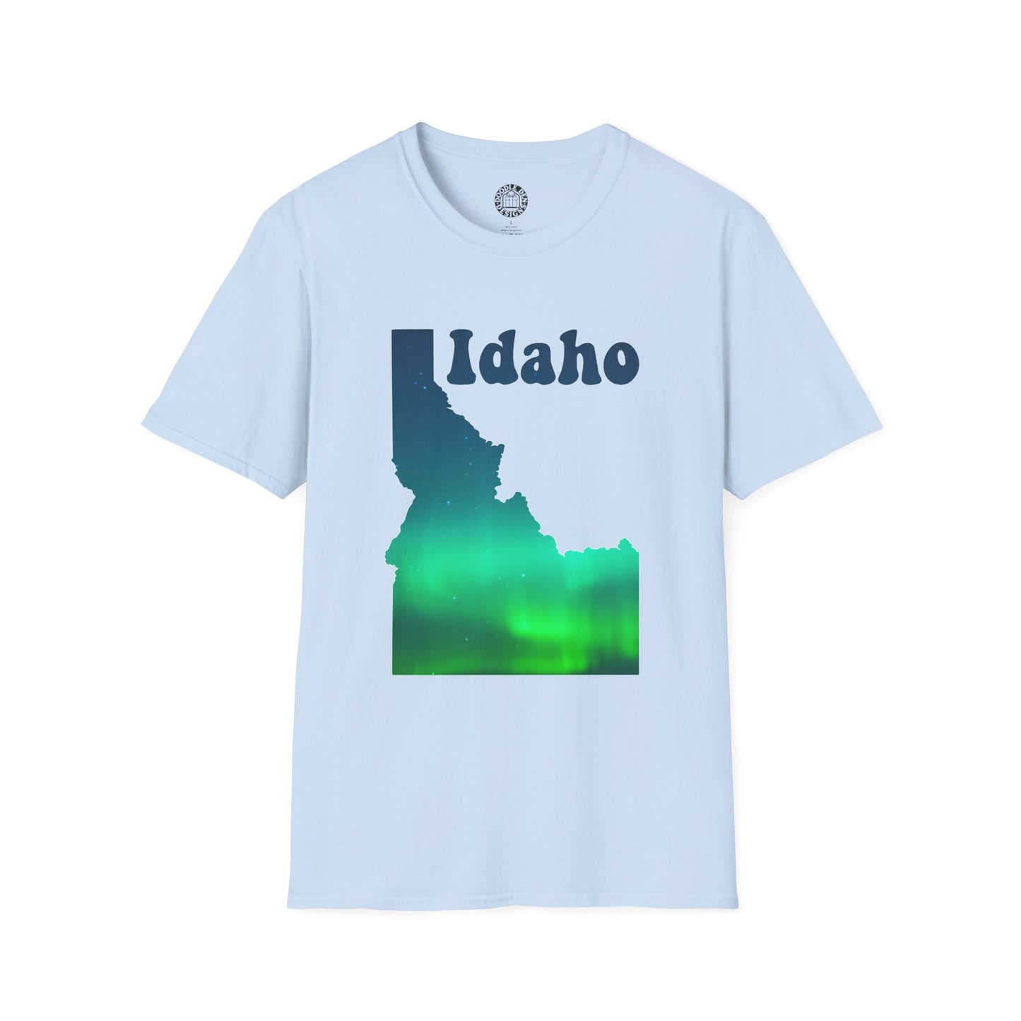 Light blue t-shirt with Idaho map graphic and green Northern Lights design on a white background