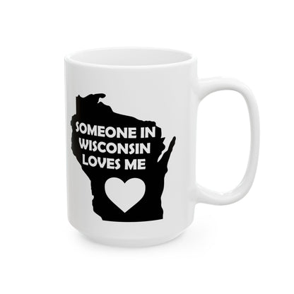 White mug with black silhouette of Wisconsin and text 'Someone in Wisconsin loves me' on a white background