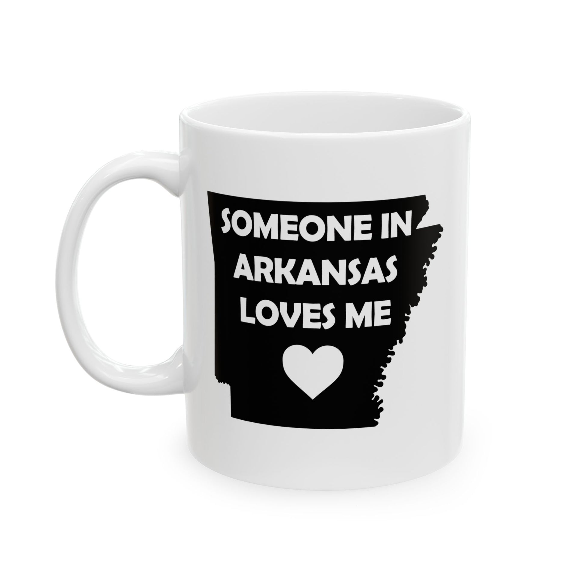 White mug with black text Someone In 
Arkansas Loves Me and heart design on a white background