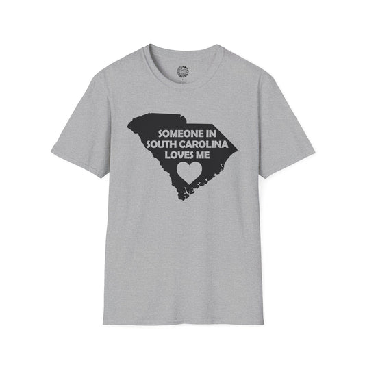 Gray t-shirt with a graphic of South Carolina and text 'Someone in South Carolina loves me' on a white background