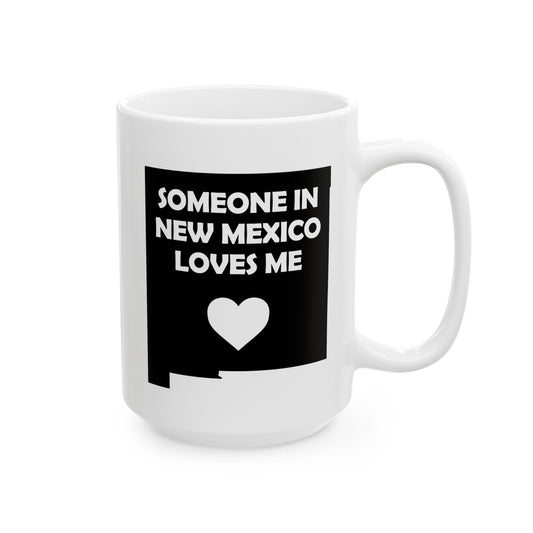 White mug with text 'SOMEONE IN NEW MEXICO LOVES ME' on a black background