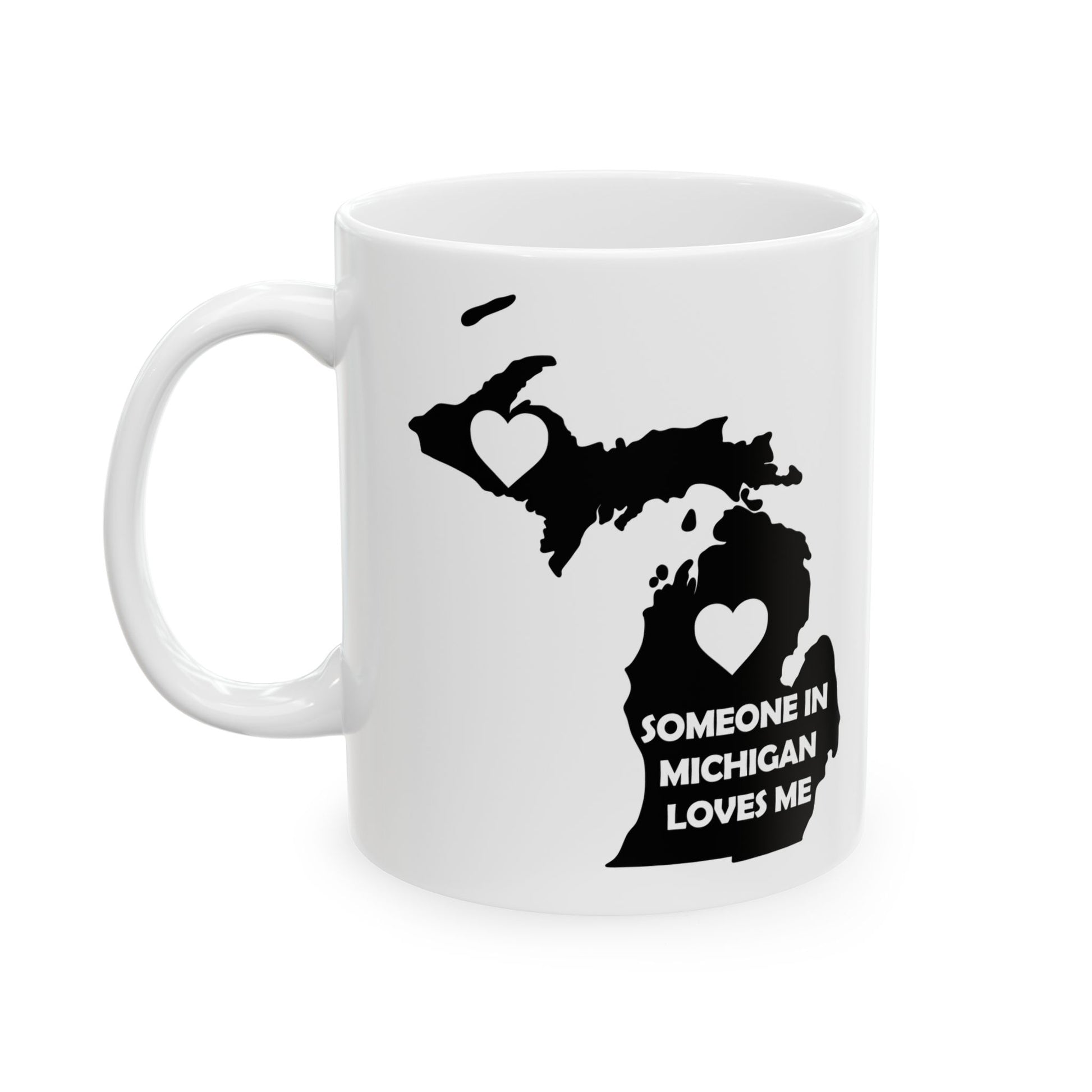 White mug with black outline of Michigan and text 'Someone in Michigan loves me' on a white background