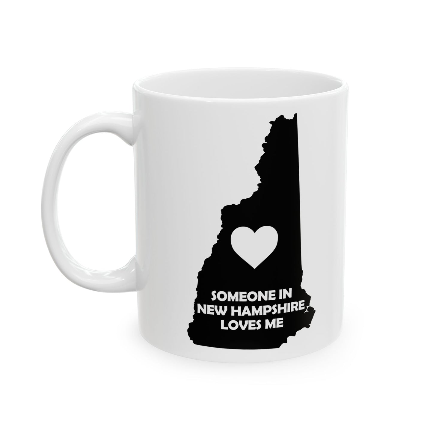 White mug with black silhouette of New Hampshire and heart design on a white background