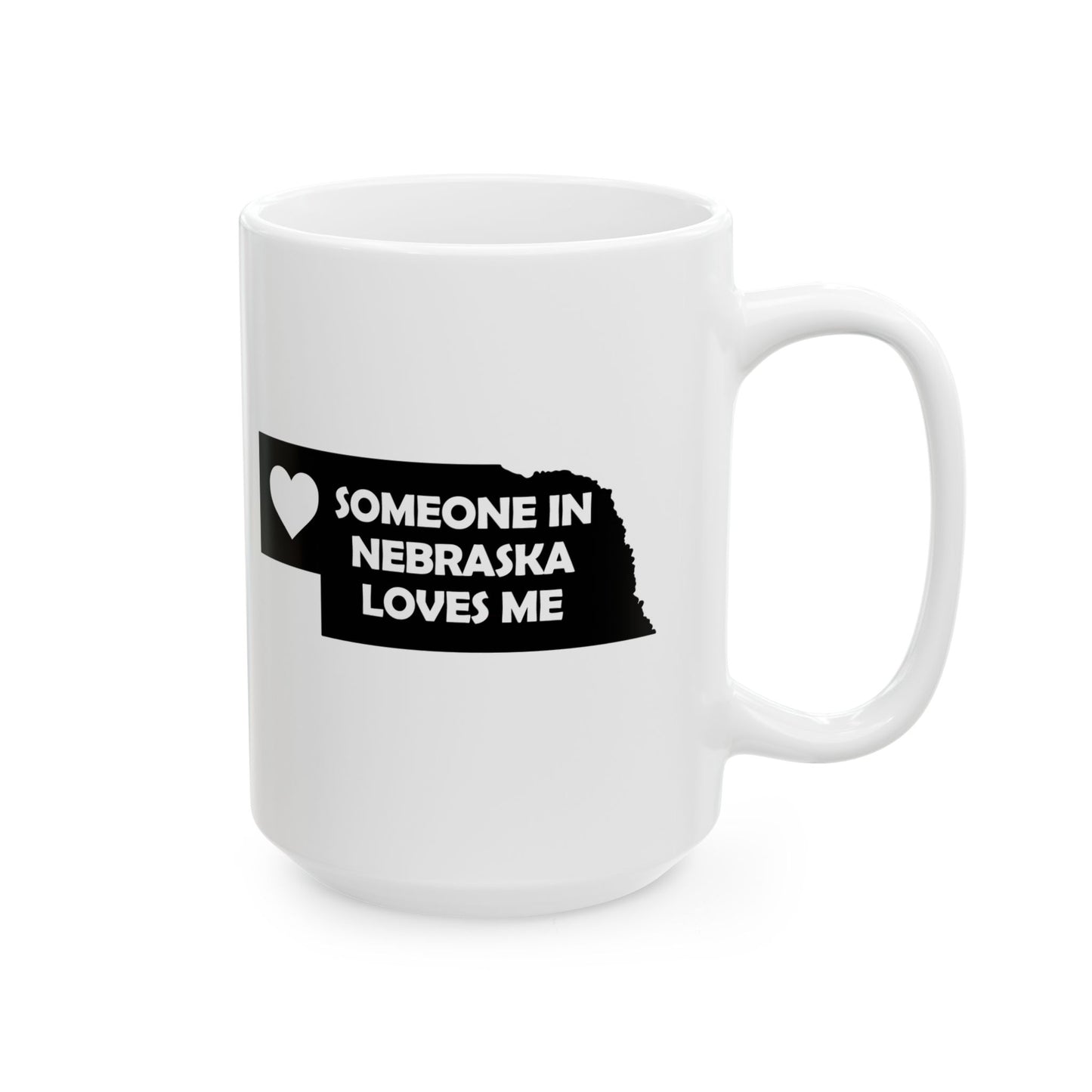 White mug with black text and heart design on a white background with text  Someone In Nebraska Loves Me