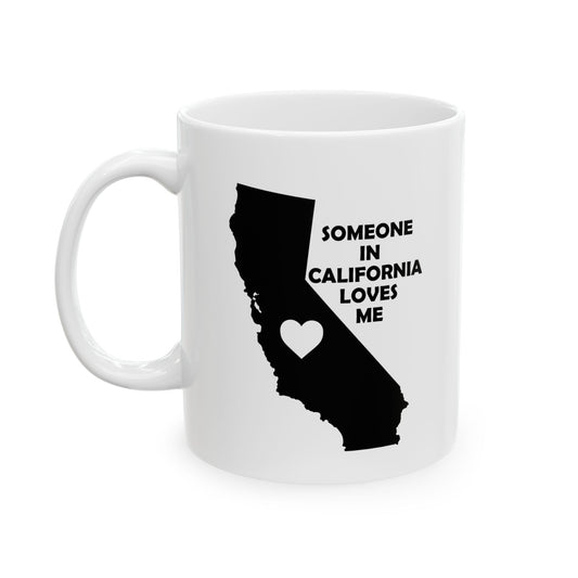 White mug with black silhouette of California and text 'Someone in California loves me' on a white background