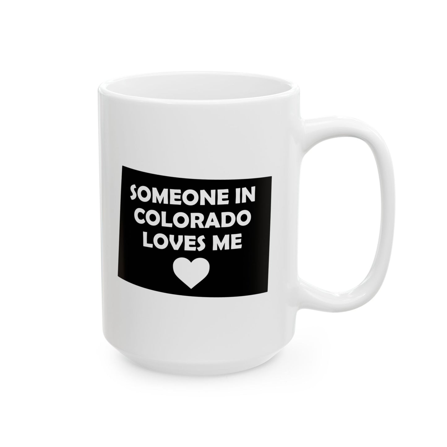 White mug with black text Someone In Colorado Loves Me and heart design on a white background