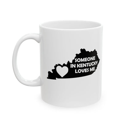 White mug with black text and map of Kentucky design on a white background with text  Someone In Kentucky Loves Me