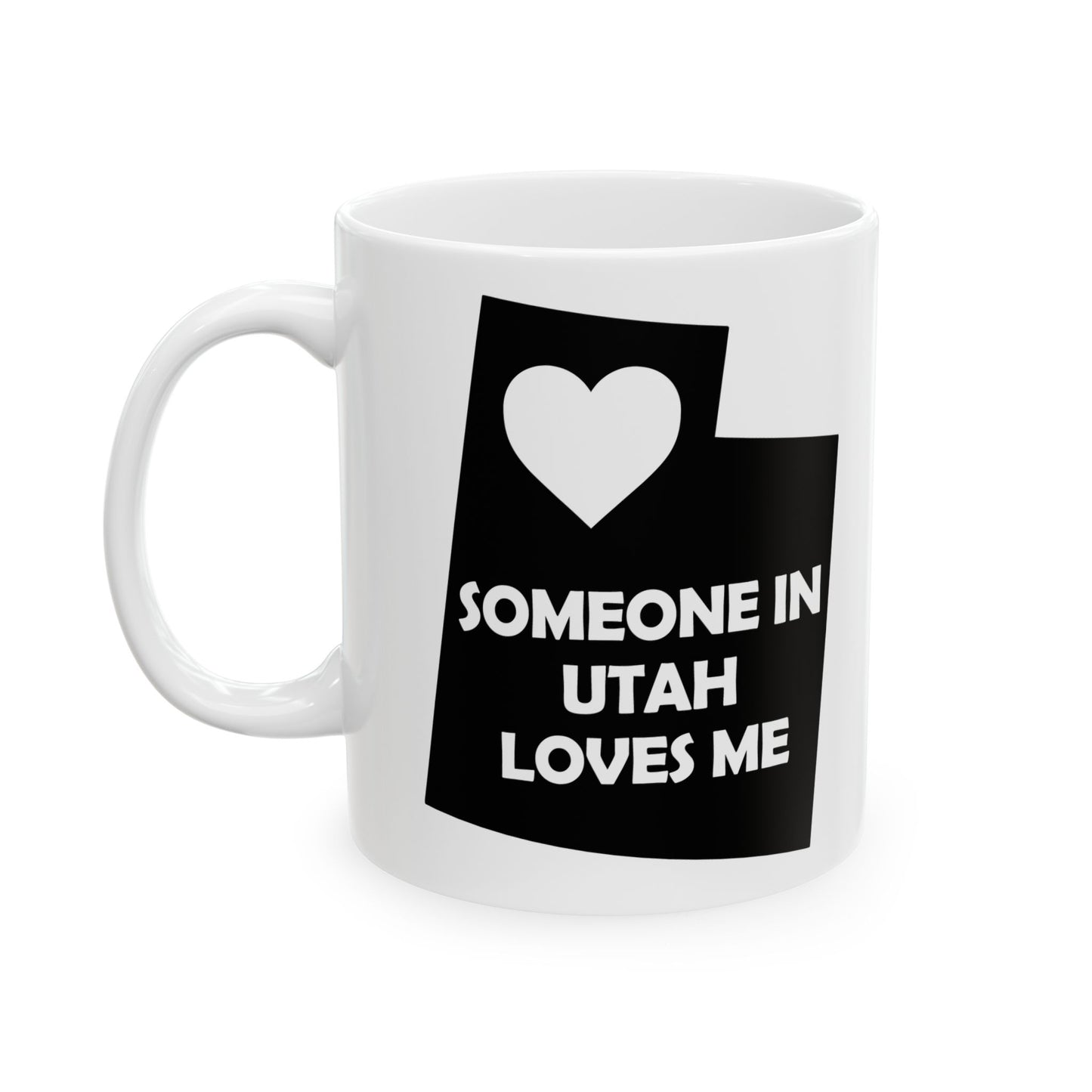 White mug with black graphic and text 'SOMEONE IN UTAH LOVES ME' on a white background