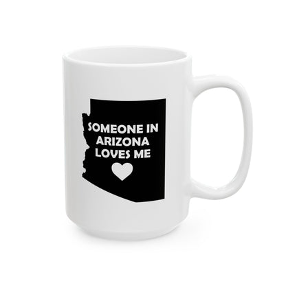 White mug with black text 'SOMEONE IN ARIZONA LOVES ME' and a heart on a white background