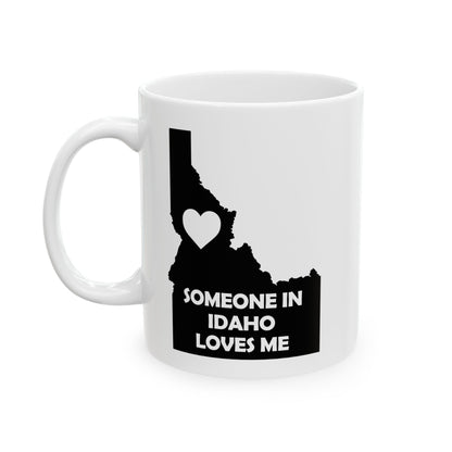 White mug with black Idaho map and heart design on a white background
