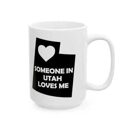 White mug with black Utah-shaped design and text 'SOMEONE IN UTAH LOVES ME' on a white background