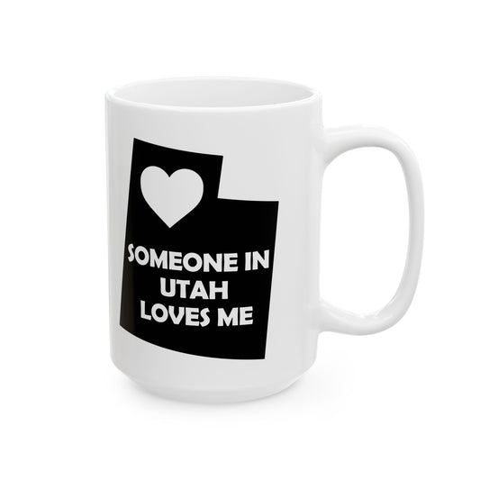 White mug with black Utah-shaped design and text 'SOMEONE IN UTAH LOVES ME' on a white background