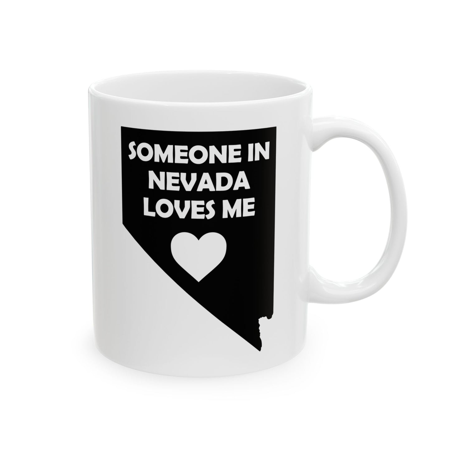 White mug with black design of Nevada outline and heart, text 'SOMEONE IN NEVADA LOVES ME' on a white background