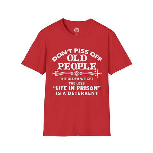 Red t-shirt with white text on a white background that says don't piss off old people