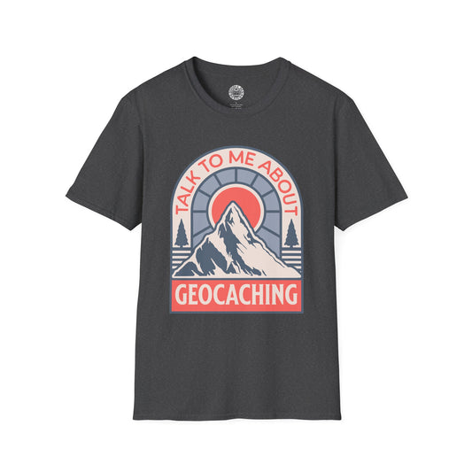 Dark gray t-shirt with a mountain graphic and text 'Talk to me about geocaching' on a white background