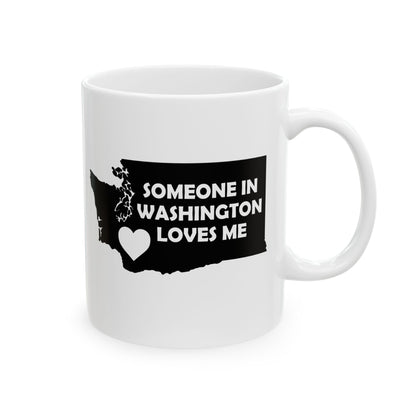 White mug with a black graphic of Washington state and text 'Someone in Washington loves me' on a white background