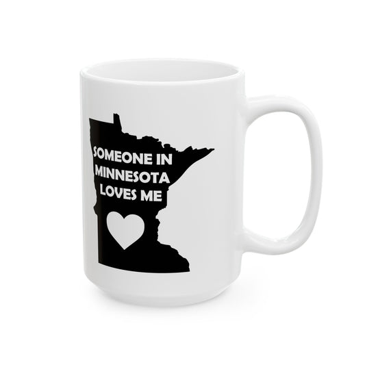 White mug with black silhouette of Minnesota and text 'Someone in Minnesota loves me' on a white background