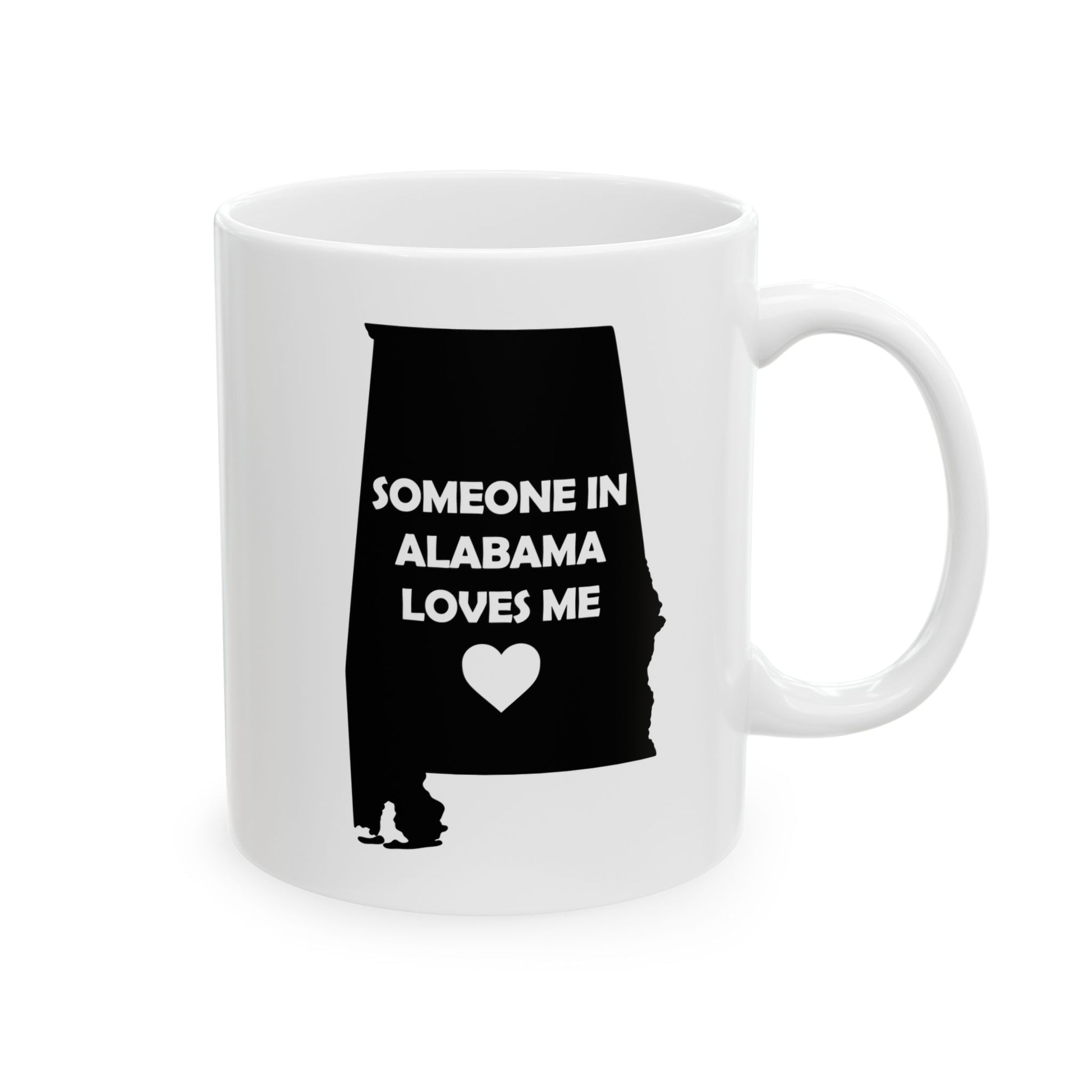 White mug with black silhouette of Alabama and text 'Someone in Alabama loves me' on a white background