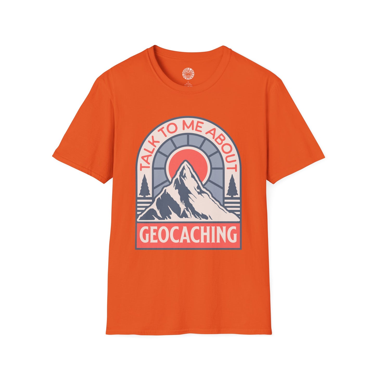 Orange t-shirt with a mountain graphic and text 'Talk to me about geocaching' on a white background