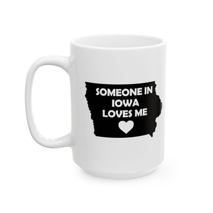 White mug with black Iowa map and text 'Someone in Iowa loves me' on a white background