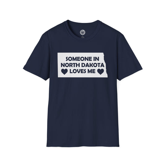Navy blue t-shirt with text 'Someone in North Dakota loves me' on a white background