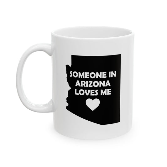 White mug with black Arizona outline and text 'Someone in Arizona loves me' on a white background