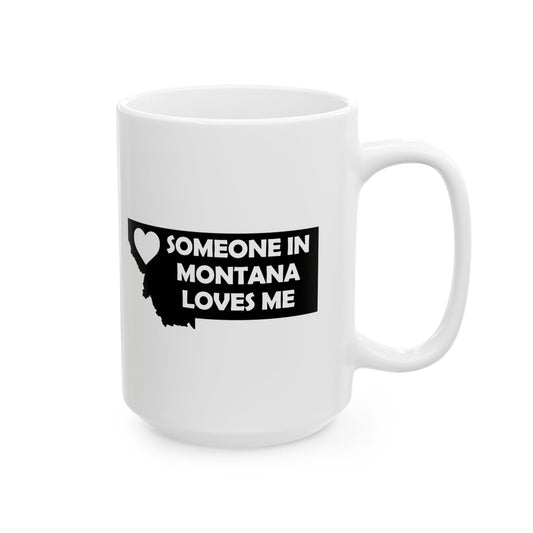 White mug with black graphic and text 'SOMEONE IN MONTANA LOVES ME' on a white background