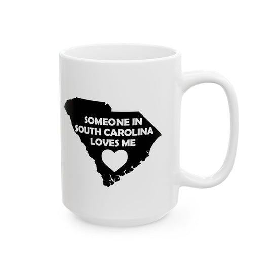 White mug with black text 'Someone in South Carolina loves me' and a heart on a white background