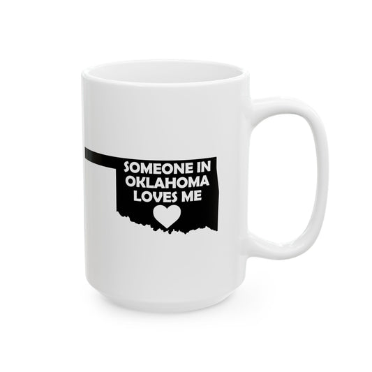 White mug with black text 'SOMEONE IN OKLAHOMA LOVES ME' on a white background