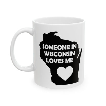 White mug with black silhouette of Wisconsin and text 'Someone in Wisconsin loves me' on a white background