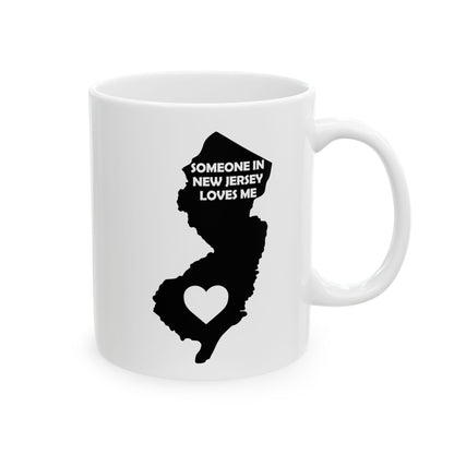 White mug with black silhouette of New Jersey and text 'Someone in New Jersey loves me' on a white background