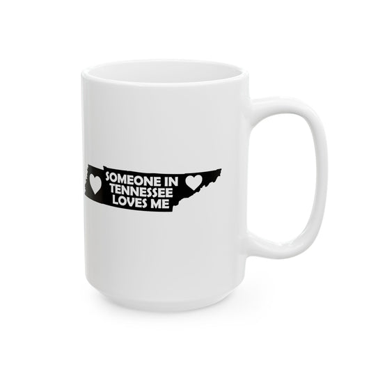 White mug with a black design and text on a white background  with text  Someone In Tennessee Loves Me