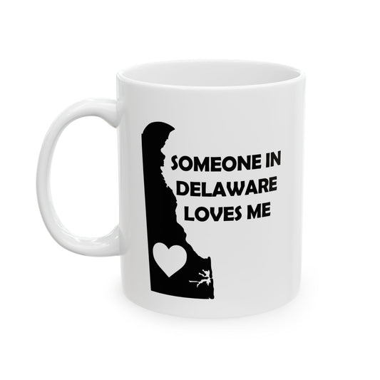 White mug with black silhouette of Delaware and text 'Someone in Delaware loves me' on a white background