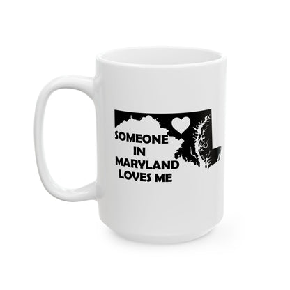 White mug with black text and map design on a white background  with text  Someone In Maryland Loves Me