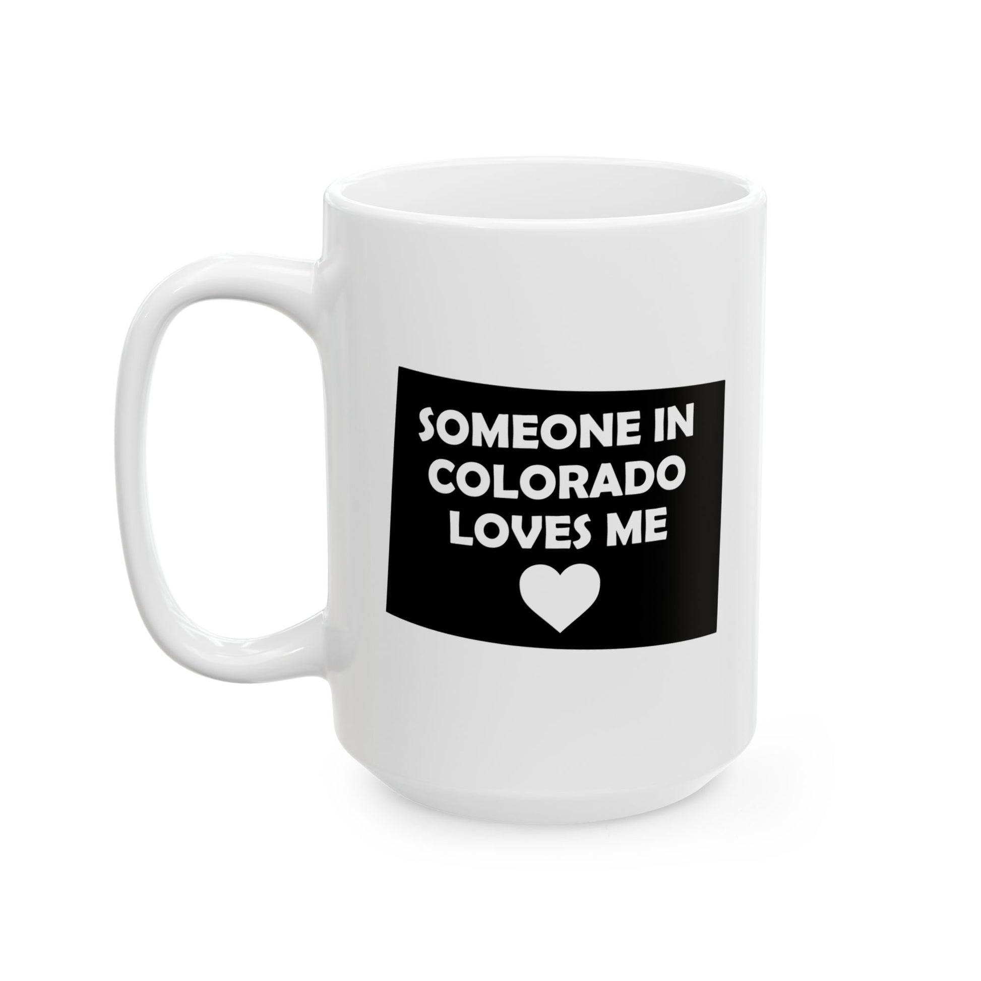 White mug with a black label reading 'Someone in Colorado loves me' on a white background