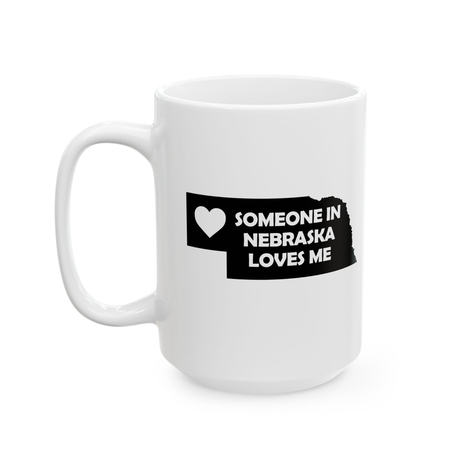 White mug with black text 'Someone in Nebraska loves me' on a white background
