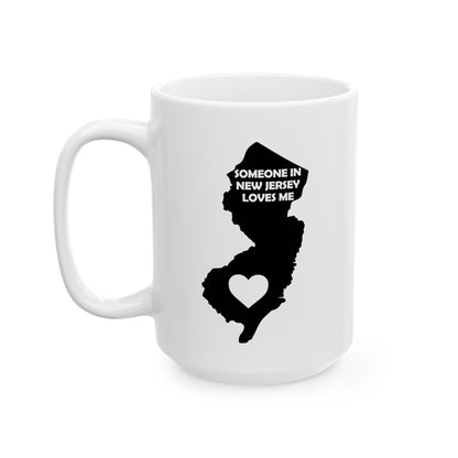 White mug with black silhouette of New Jersey and text 'Someone in New Jersey loves me' on a white background