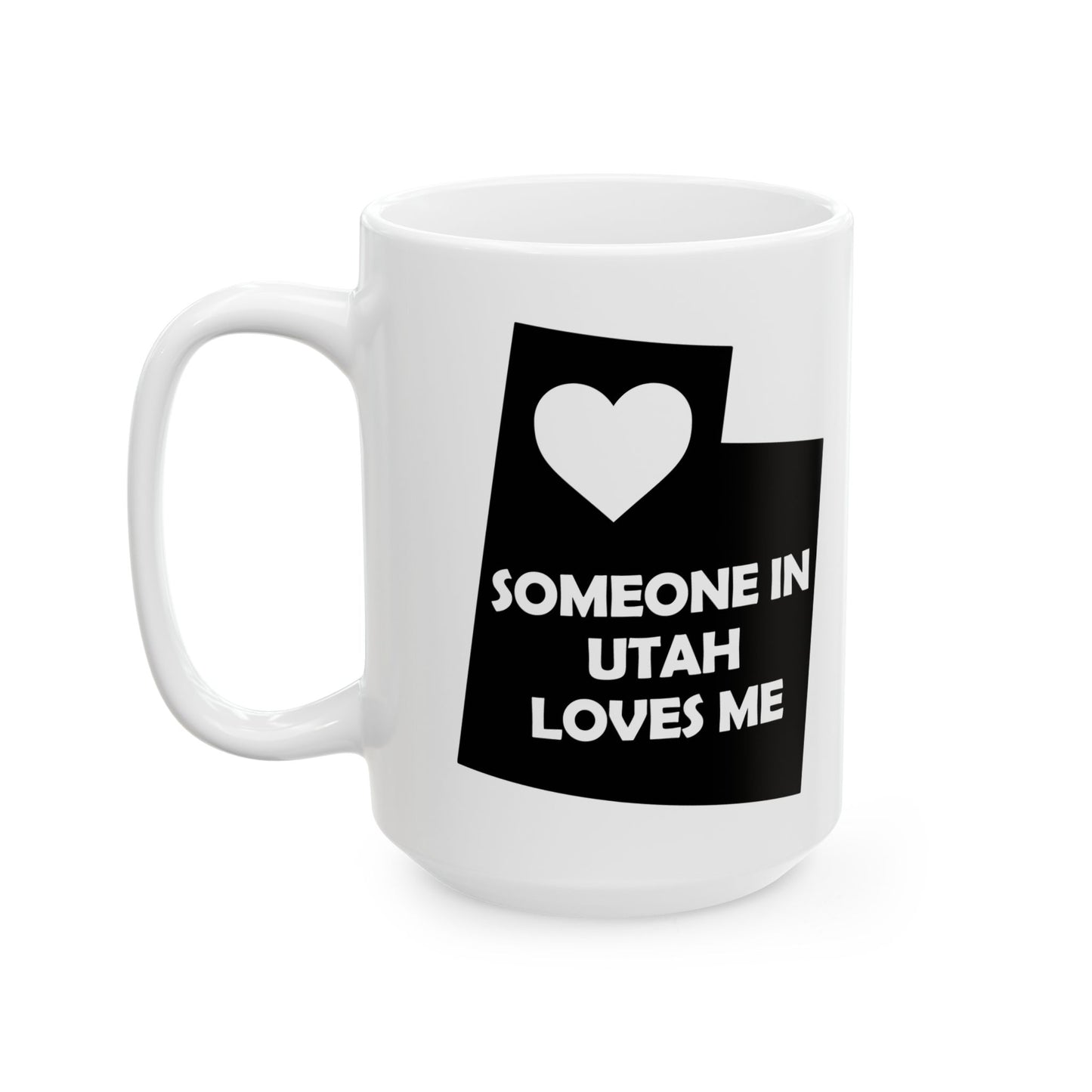 White mug with black graphic and text 'SOMEONE IN UTAH LOVES ME' on a white background