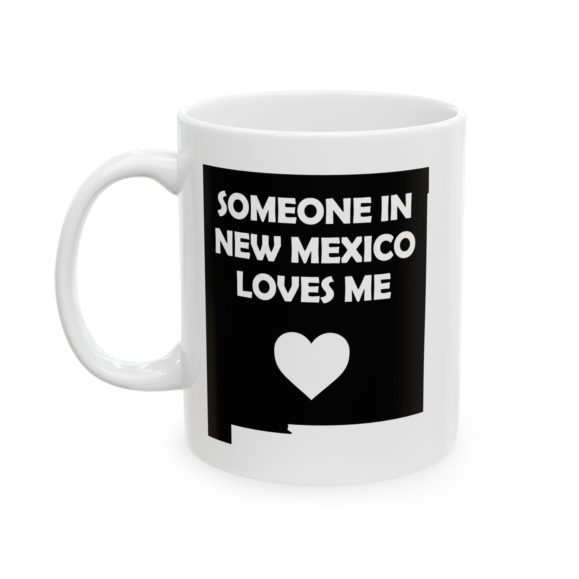 White mug with black design featuring 'Someone in New Mexico loves me' text and a heart symbol on a white background.