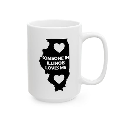 White mug with black silhouette of Illinois and text 'Someone in Illinois loves me' on a white background