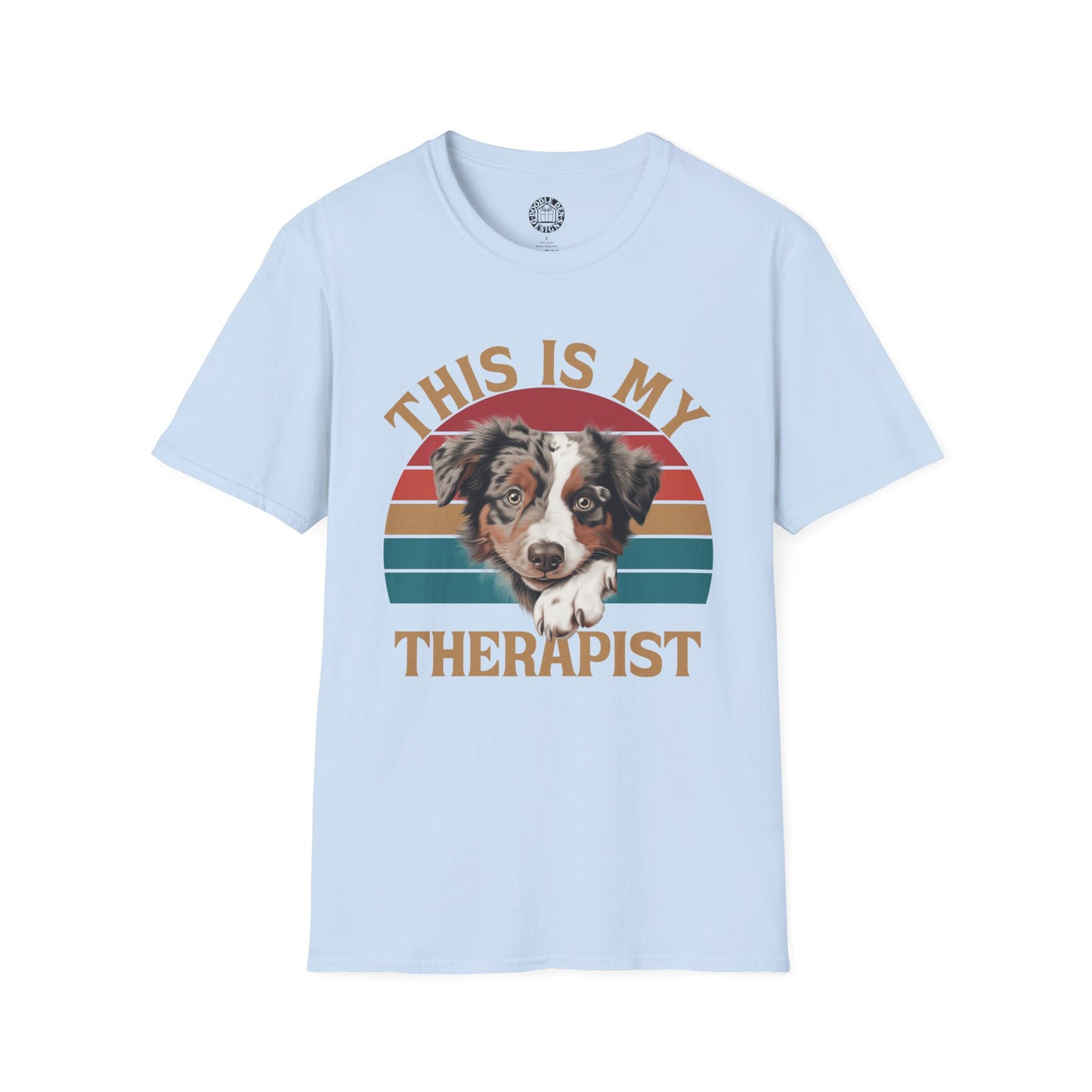 Light blue t-shirt with a Australian Shepherd dog graphic and text 'This is my therapist' on a white background