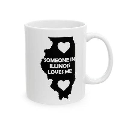 White mug with black outline of Illinois and text 'Someone in Illinois loves me' on a white background