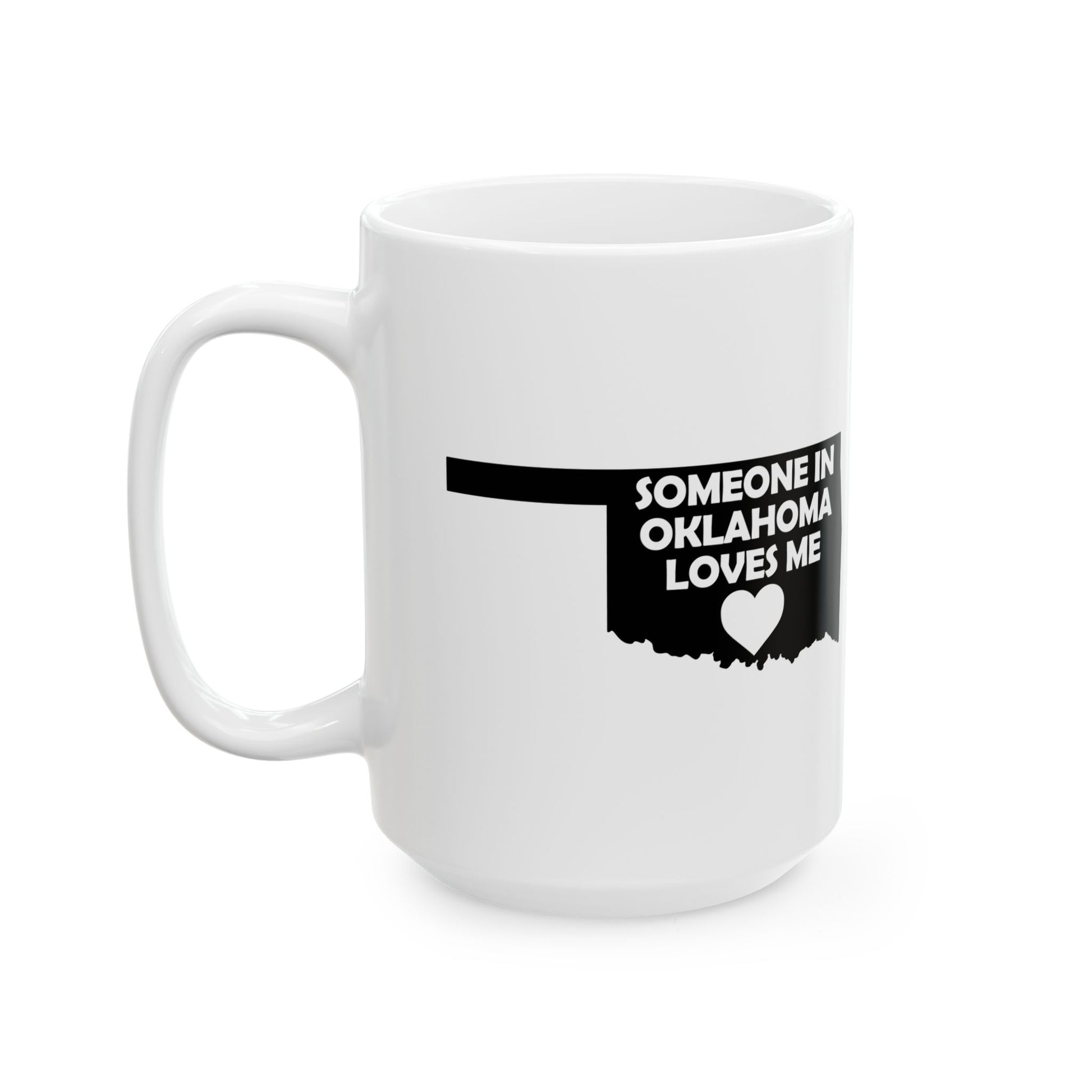 White mug with black text 'SOMEONE IN OKLAHOMA LOVES ME' on a white background