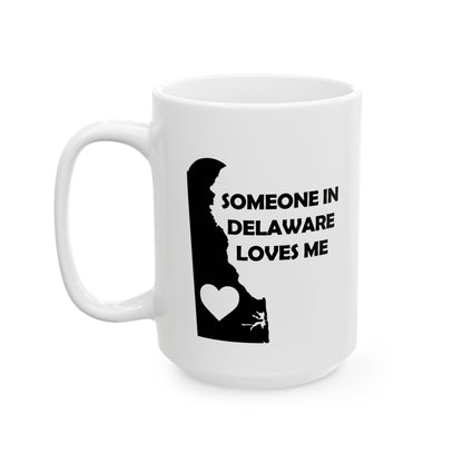 White mug with Delaware outline and text 'Someone in Delaware loves me' on a white background