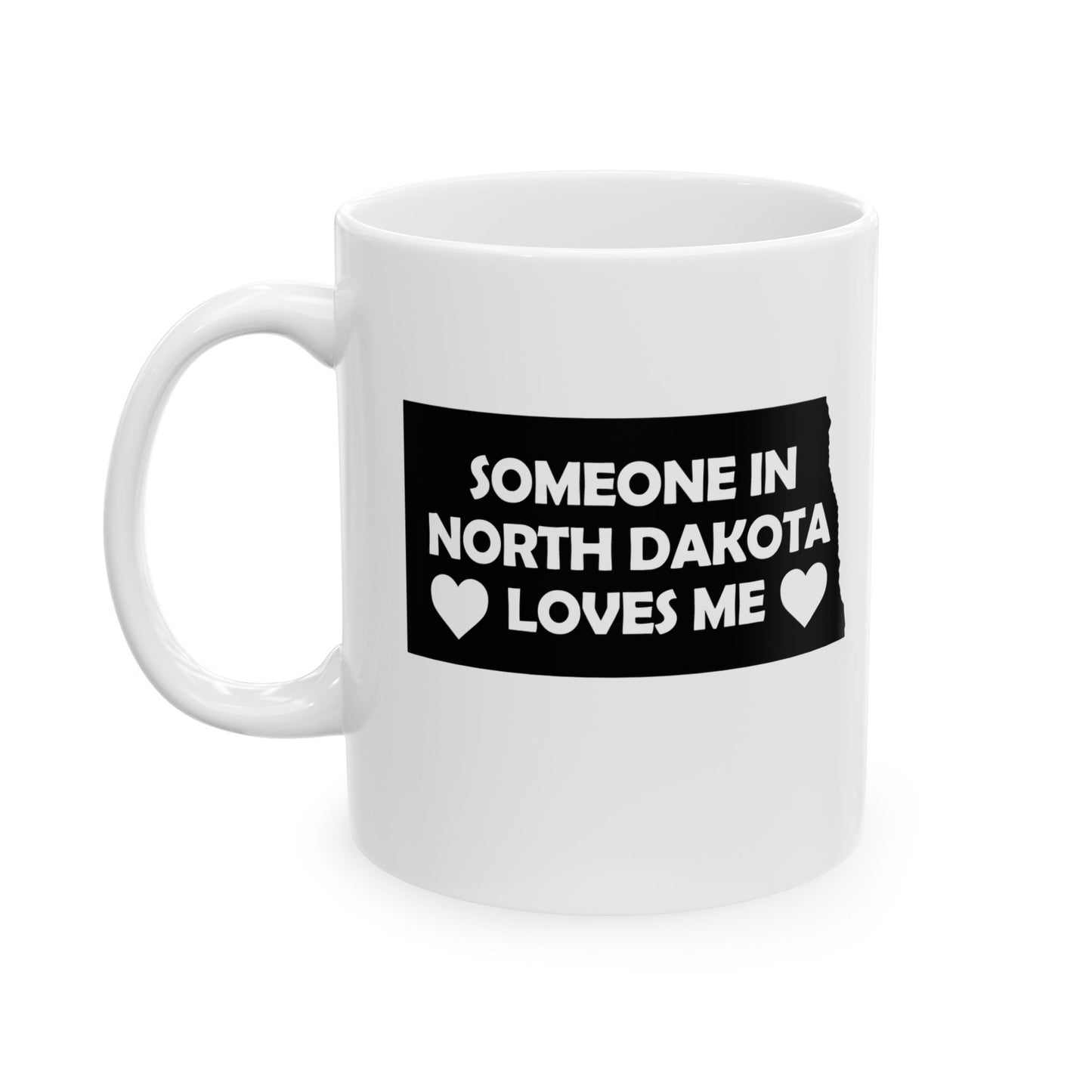 White mug with text 'Someone in North Dakota loves me' on a white background