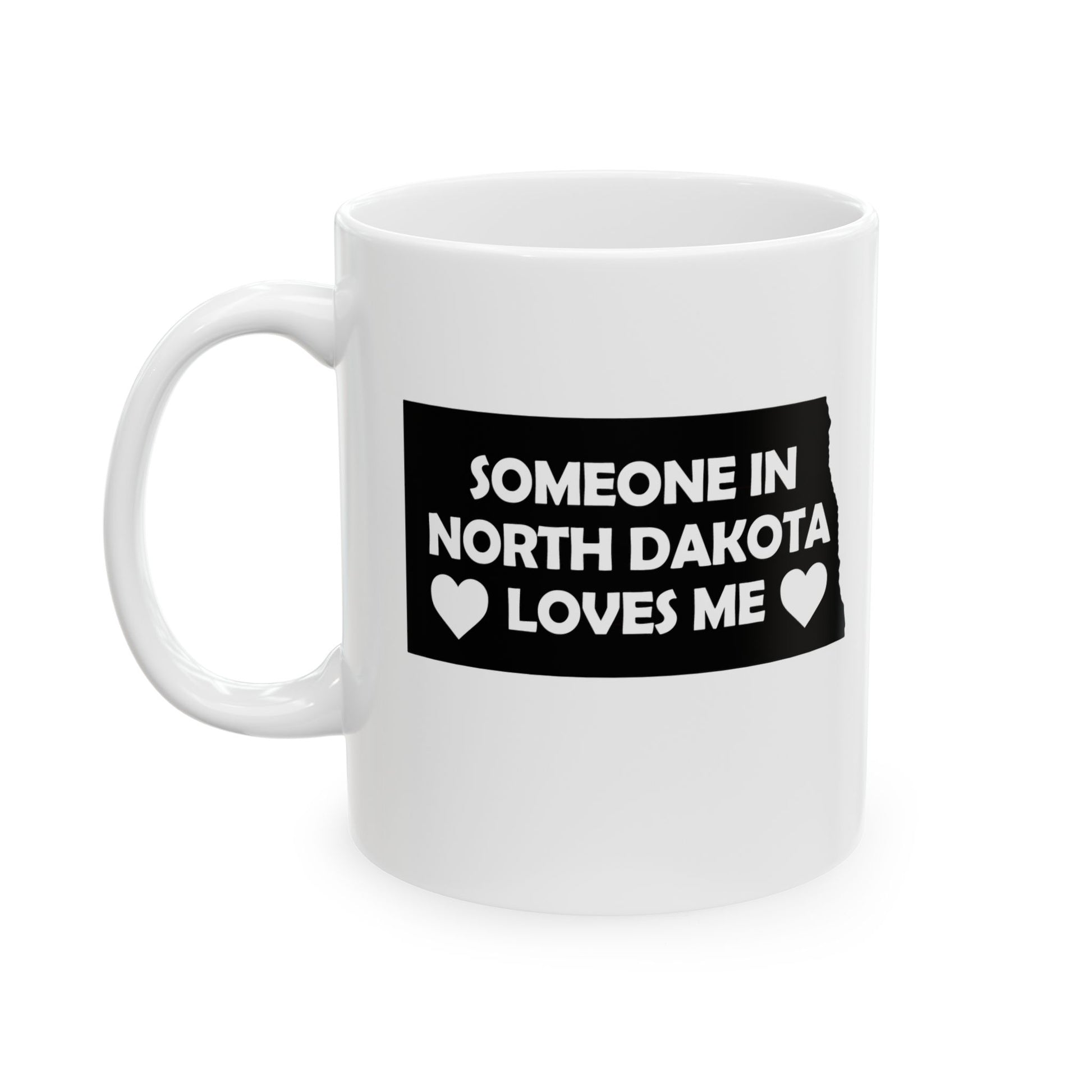 White mug with text 'Someone in North Dakota loves me' on a white background