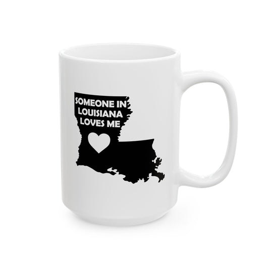 White mug with black silhouette of Louisiana and text 'Someone in Louisiana loves me' on a white background