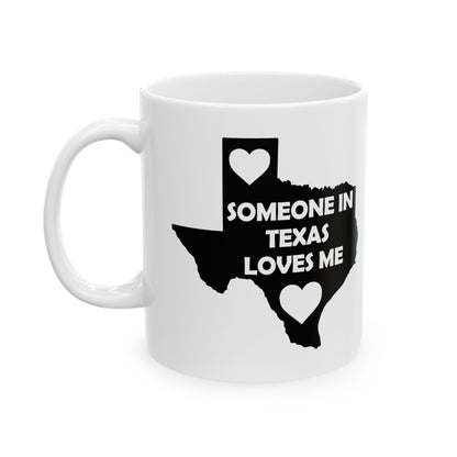White mug with black Texas outline and text 'Someone in Texas loves me' on a white background