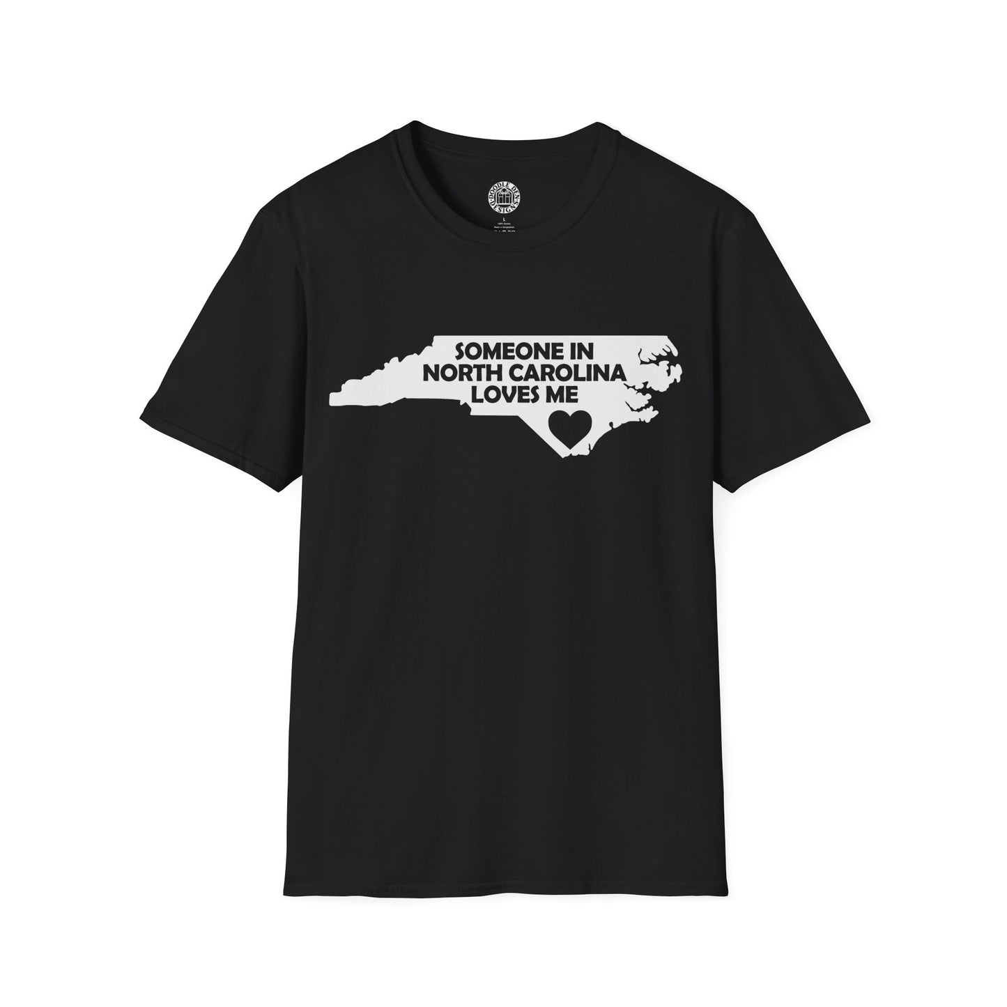 Black t-shirt with white graphic and text 'SOMEONE IN NORTH CAROLINA LOVES ME' on a white background